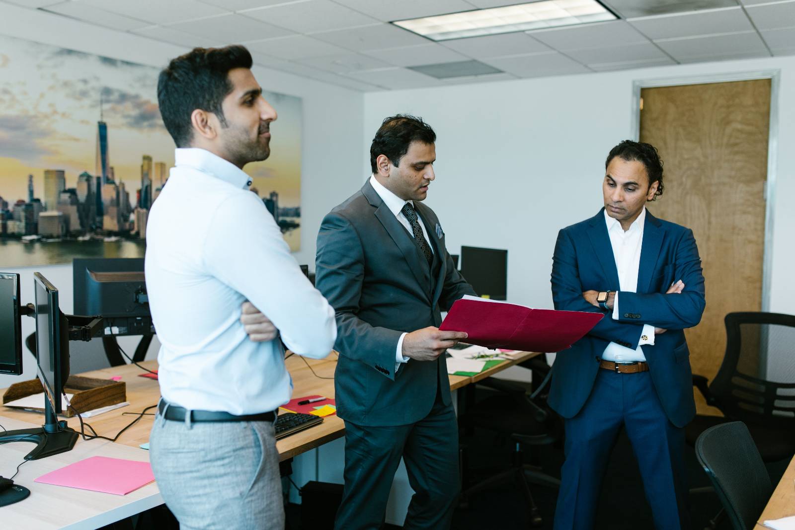 Professionals reviewing documents in an office