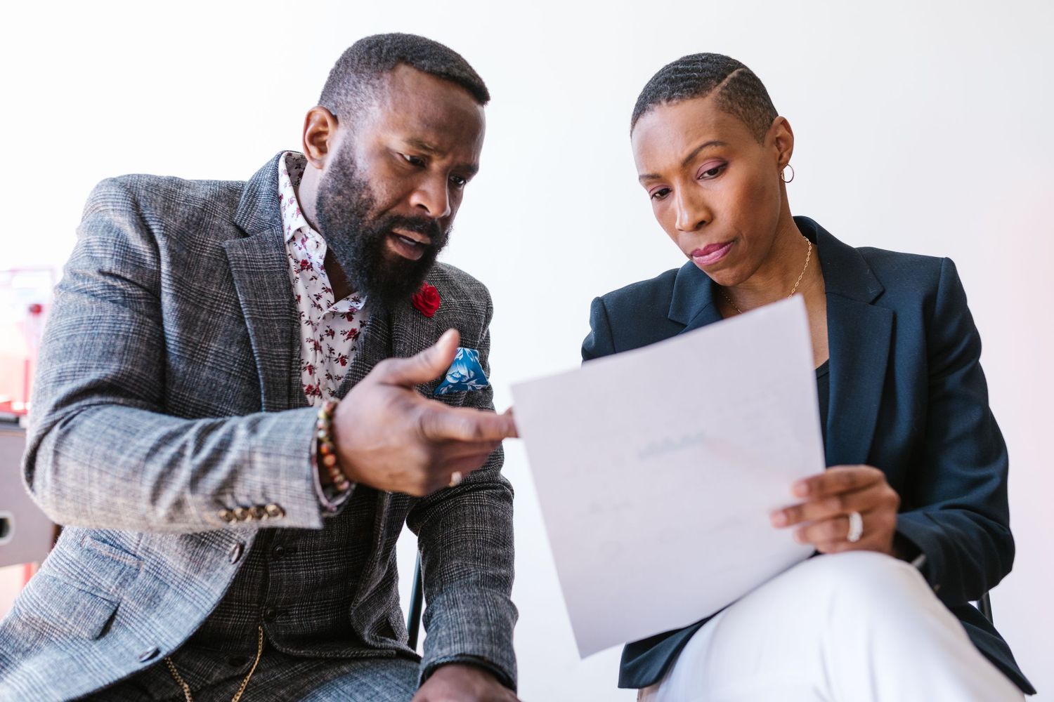 A mentor talking a candidate through their submission